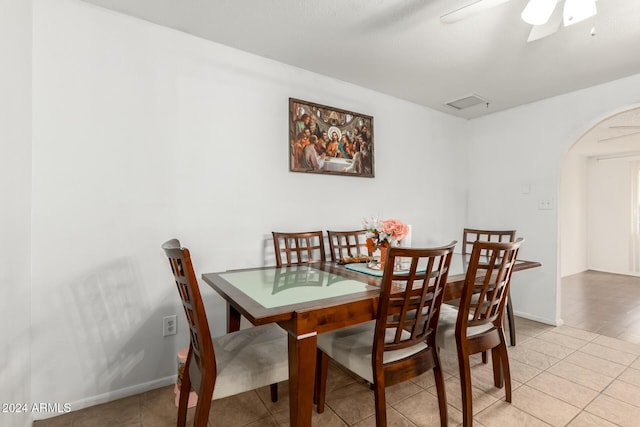 dining area featuring light hardwood / wood-style flooring and ceiling fan