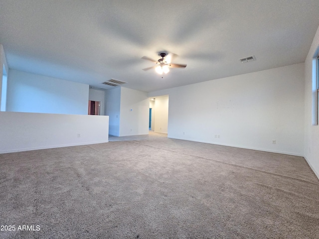 19954 W Moonlight Path, Buckeye, AZ 85326 - carpeted empty room with ceiling fan and baseboards