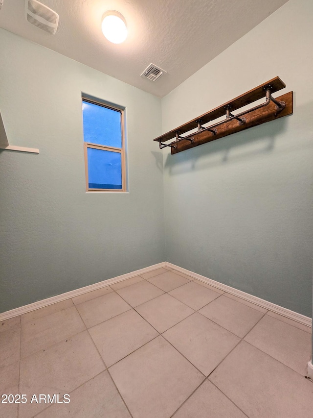 19954 W Moonlight Path, Buckeye, AZ 85326 - spacious closet with tile patterned flooring