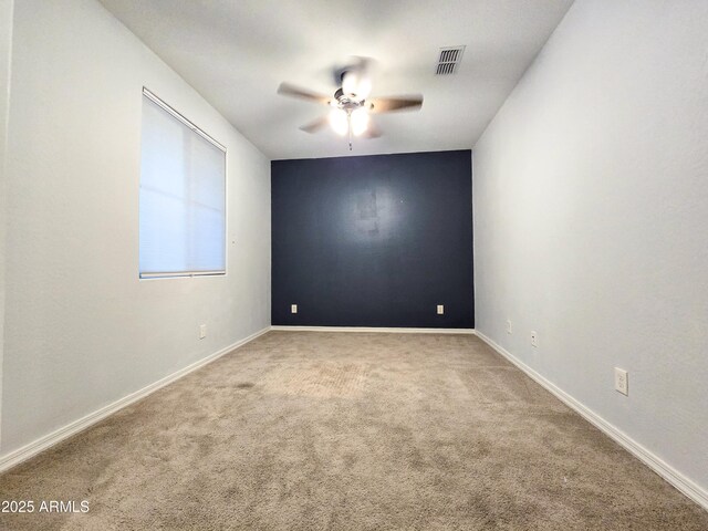 19954 W Moonlight Path, Buckeye, AZ 85326 - carpeted spare room featuring ceiling fan and baseboards