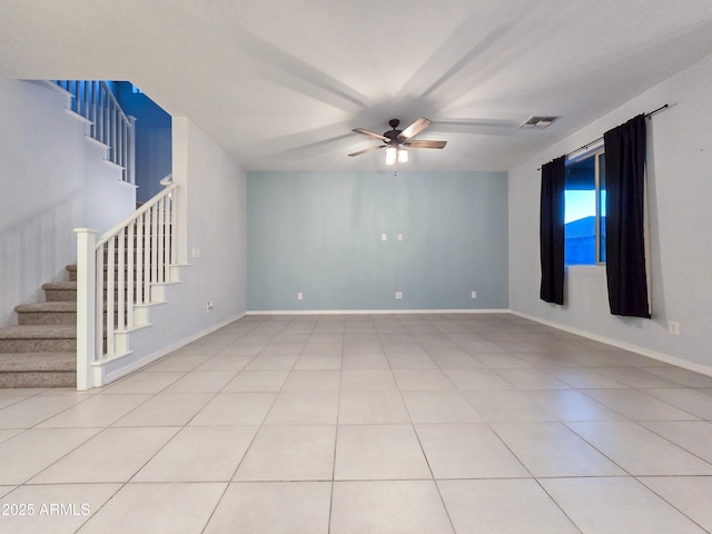 19954 W Moonlight Path, Buckeye, AZ 85326 - unfurnished room featuring a ceiling fan, stairs, light tile patterned flooring, and baseboards