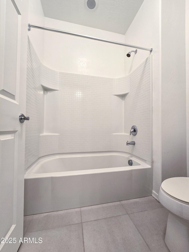 19954 W Moonlight Path, Buckeye, AZ 85326 - full bathroom featuring toilet, tile patterned flooring, and shower / bathtub combination
