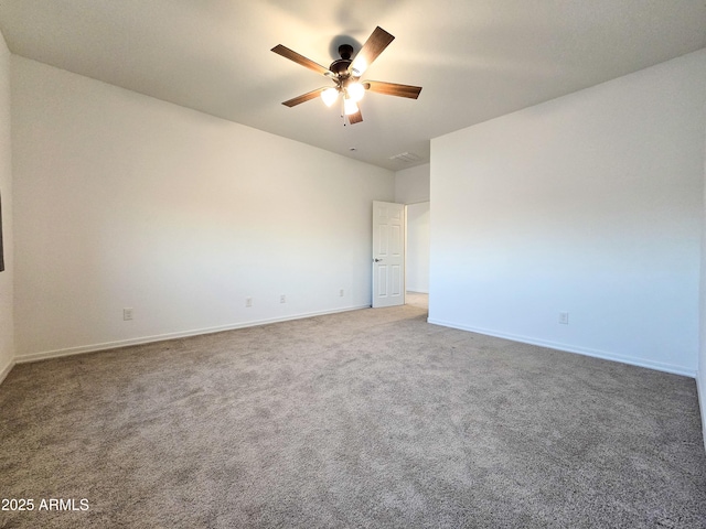 19954 W Moonlight Path, Buckeye, AZ 85326 - empty room with carpet floors, a ceiling fan, and baseboards