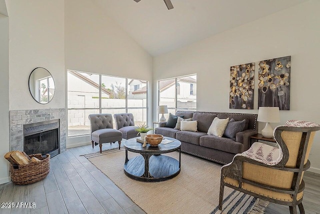 living room with high vaulted ceiling