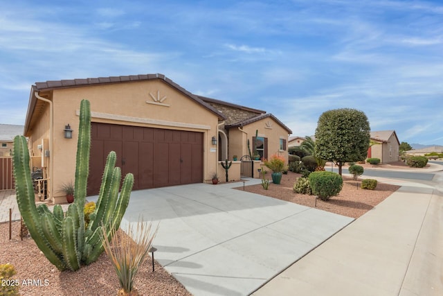 view of front of home with a garage