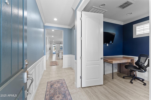 office area featuring a decorative wall, a wainscoted wall, recessed lighting, visible vents, and crown molding