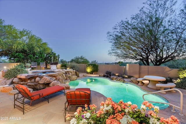 view of pool featuring a fenced in pool, a fenced backyard, and a patio area