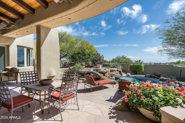 view of patio with a fenced in pool and a fenced backyard