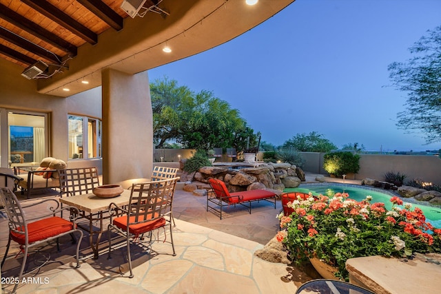 view of patio with a fenced in pool and a fenced backyard