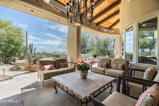 view of patio featuring fence and outdoor lounge area
