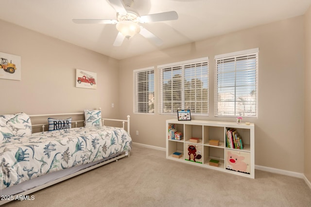 carpeted bedroom featuring ceiling fan