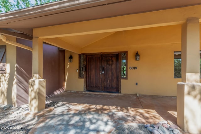 property entrance with a porch