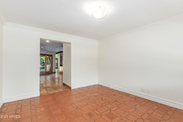 spare room with ornamental molding