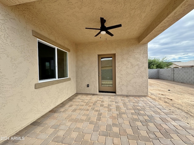 view of patio / terrace featuring ceiling fan