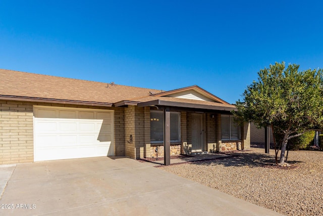 single story home featuring a garage