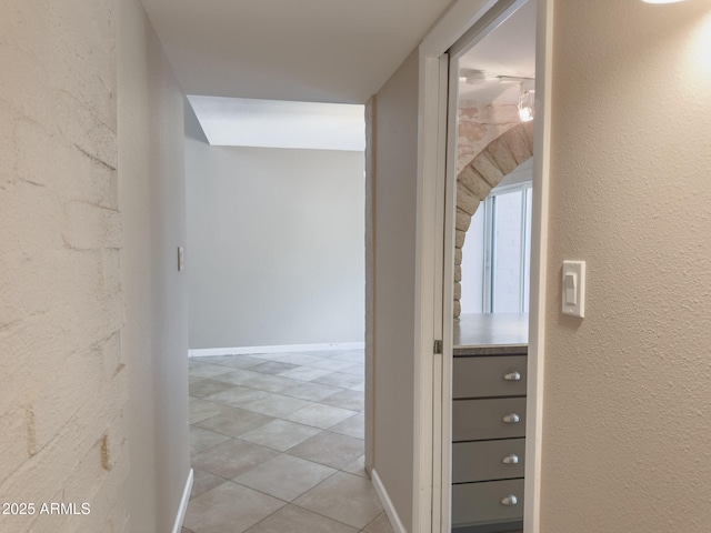 7770 E Camelback Rd Unit 23, Scottsdale, AZ 85251 - corridor featuring light tile patterned floors
