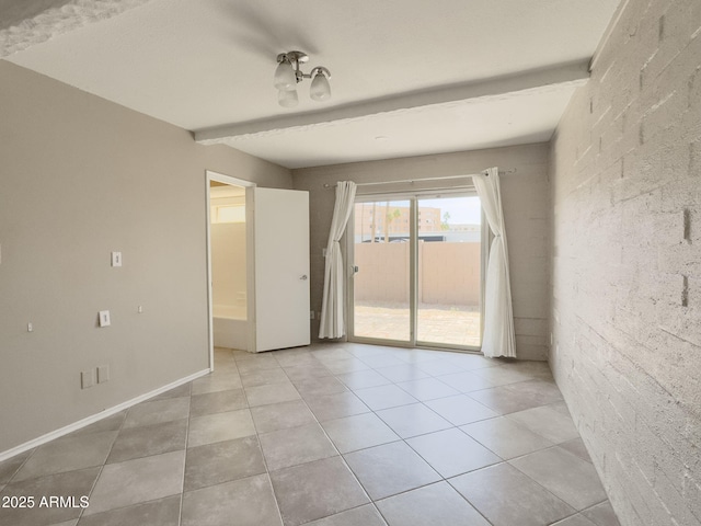 7770 E Camelback Rd Unit 23, Scottsdale, AZ 85251 - unfurnished room with light tile patterned flooring