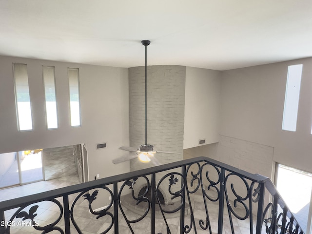 7770 E Camelback Rd Unit 23, Scottsdale, AZ 85251 - staircase with healthy amount of natural light and a high ceiling
