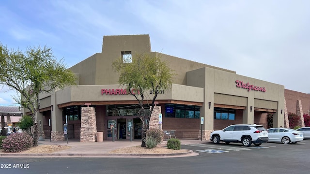 7770 E Camelback Rd Unit 23, Scottsdale, AZ 85251 - view of commercial property featuring uncovered parking