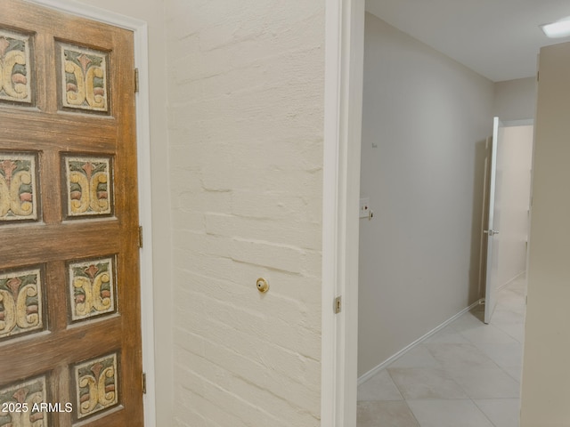 7770 E Camelback Rd Unit 23, Scottsdale, AZ 85251 - corridor featuring light tile patterned floors and baseboards