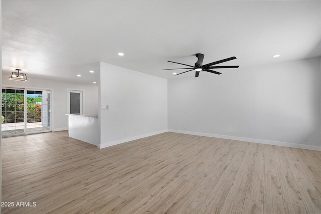 811 E Brown St, Phoenix, AZ 85020 - unfurnished room with light wood finished floors, a ceiling fan, and recessed lighting