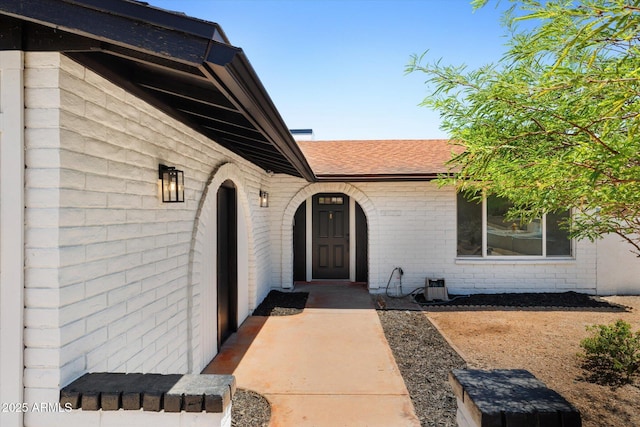 811 E Brown St, Phoenix, AZ 85020 - entrance to property with brick siding and a shingled roof