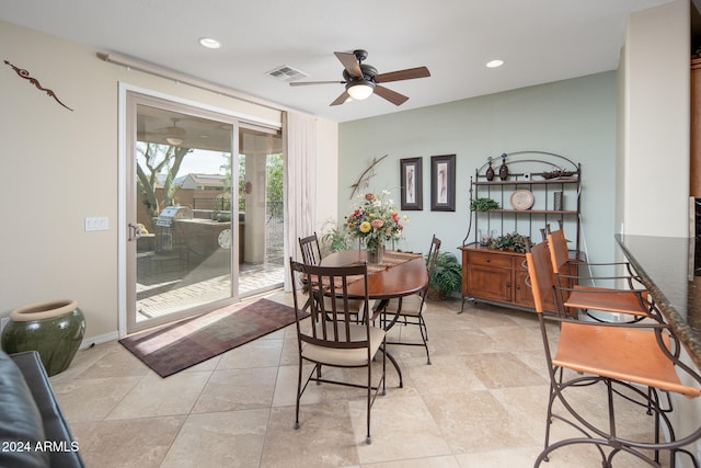 dining area with ceiling fan