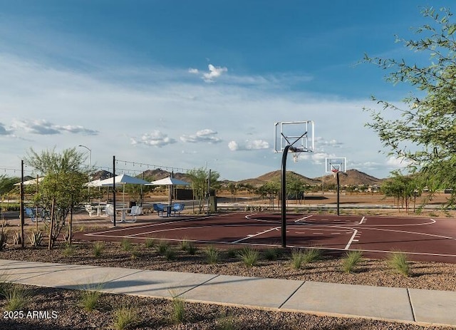 view of sport court featuring community basketball court and a mountain view