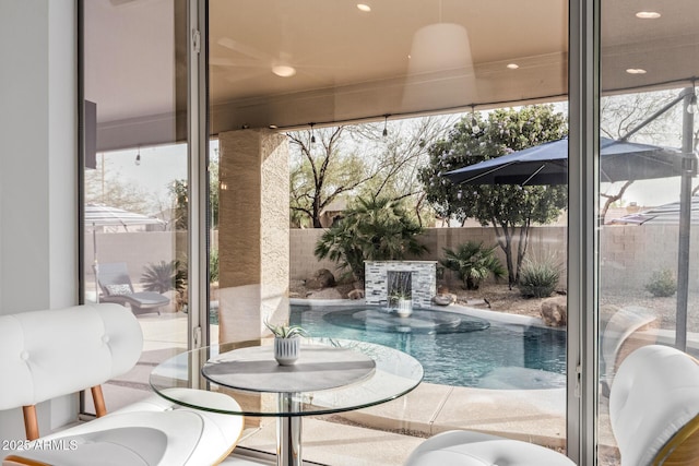 view of swimming pool featuring a fenced in pool, a patio, and a fenced backyard