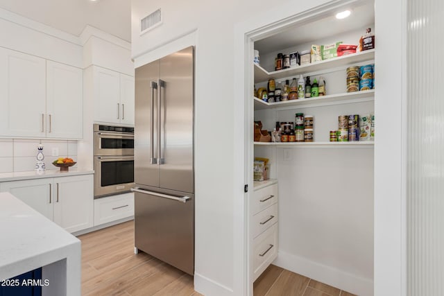 pantry with visible vents