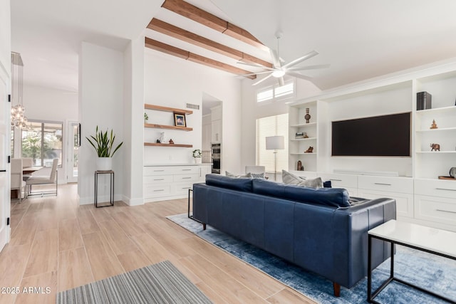 living room with light wood finished floors, visible vents, beamed ceiling, ceiling fan with notable chandelier, and high vaulted ceiling