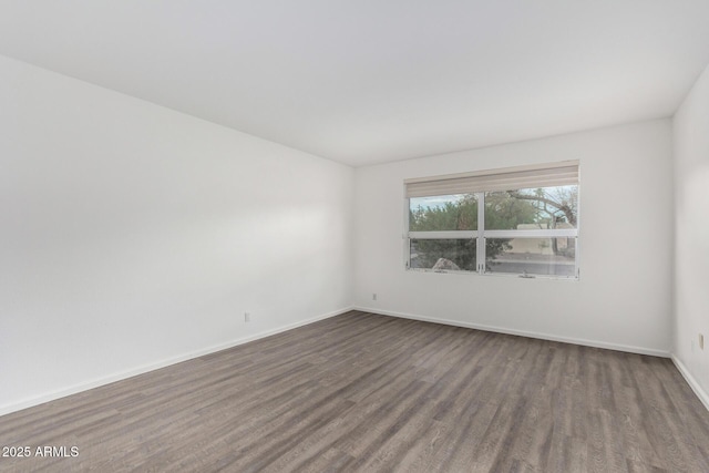 empty room featuring hardwood / wood-style floors