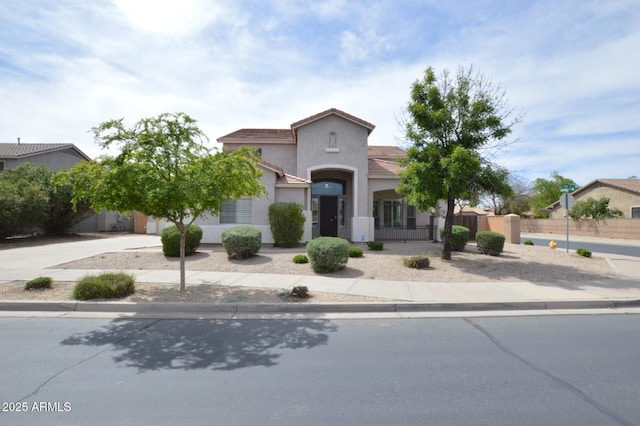20258 S 196th St, Queen Creek, AZ 85142 - mediterranean / spanish house with stucco siding and a gate