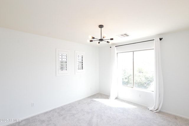 20258 S 196th St, Queen Creek, AZ 85142 - spare room featuring a chandelier and carpet flooring