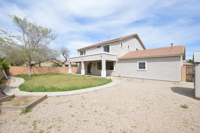 20258 S 196th St, Queen Creek, AZ 85142 - back of house featuring a fenced backyard, stucco siding, and a patio area