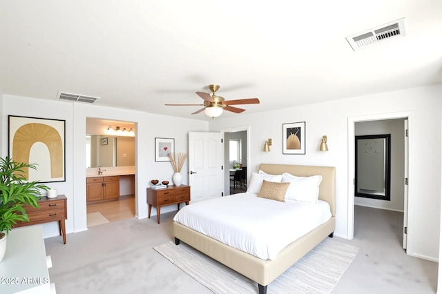 20258 S 196th St, Queen Creek, AZ 85142 - bedroom with light colored carpet, a ceiling fan, and connected bathroom