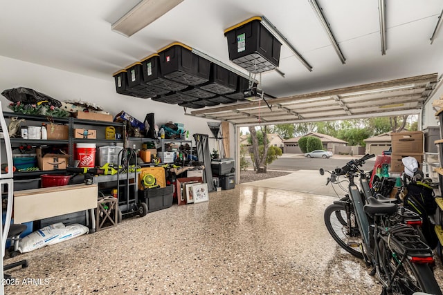 garage featuring a garage door opener