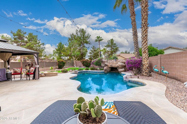view of pool featuring a gazebo, a patio, and a fenced backyard
