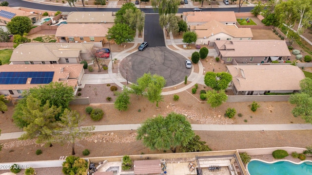 aerial perspective of suburban area with a pool