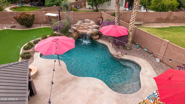 view of swimming pool with a putting area, a fenced backyard, and a patio