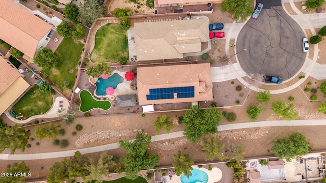 drone / aerial view of a pool