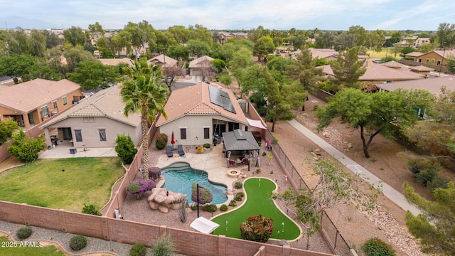 aerial view of residential area featuring a pool