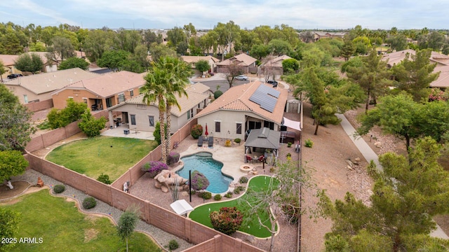 aerial perspective of suburban area with a pool