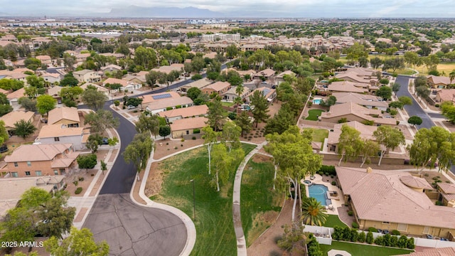aerial perspective of suburban area featuring a pool