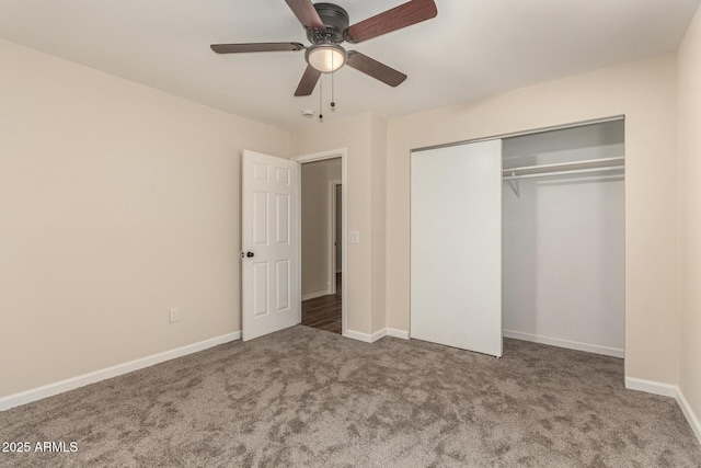 unfurnished bedroom with a ceiling fan, carpet, baseboards, and a closet