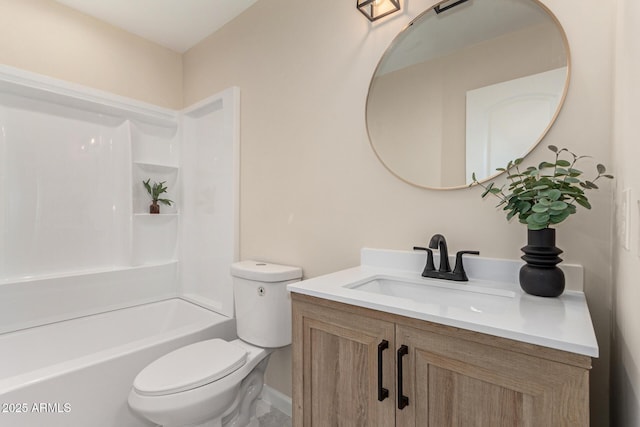 bathroom with shower / bathtub combination, vanity, and toilet