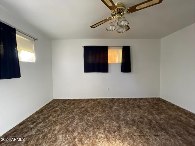 carpeted empty room with ceiling fan