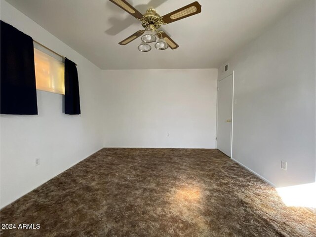 spare room featuring ceiling fan