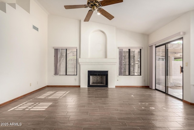 3740 W Kent Dr, Chandler, AZ 85226 - unfurnished living room with lofted ceiling, a fireplace, baseboards, a ceiling fan, and wood finish floors