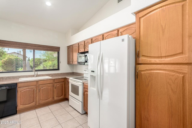 3740 W Kent Dr, Chandler, AZ 85226 - kitchen with black appliances, a sink, light tile patterned flooring, and vaulted ceiling